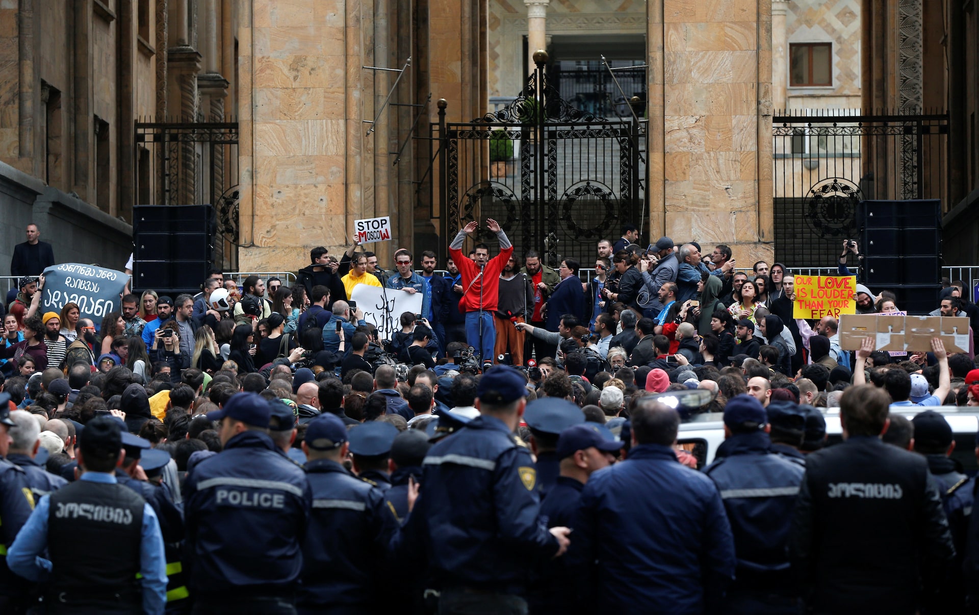 Hundreds protest in Georgia after police raid night clubs