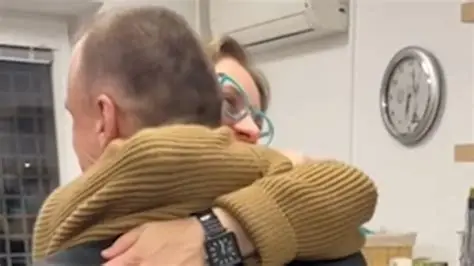 Freed RFE/RL Journalist Kuznechyk Feels 'Weight Lifted' At Seeing His Family