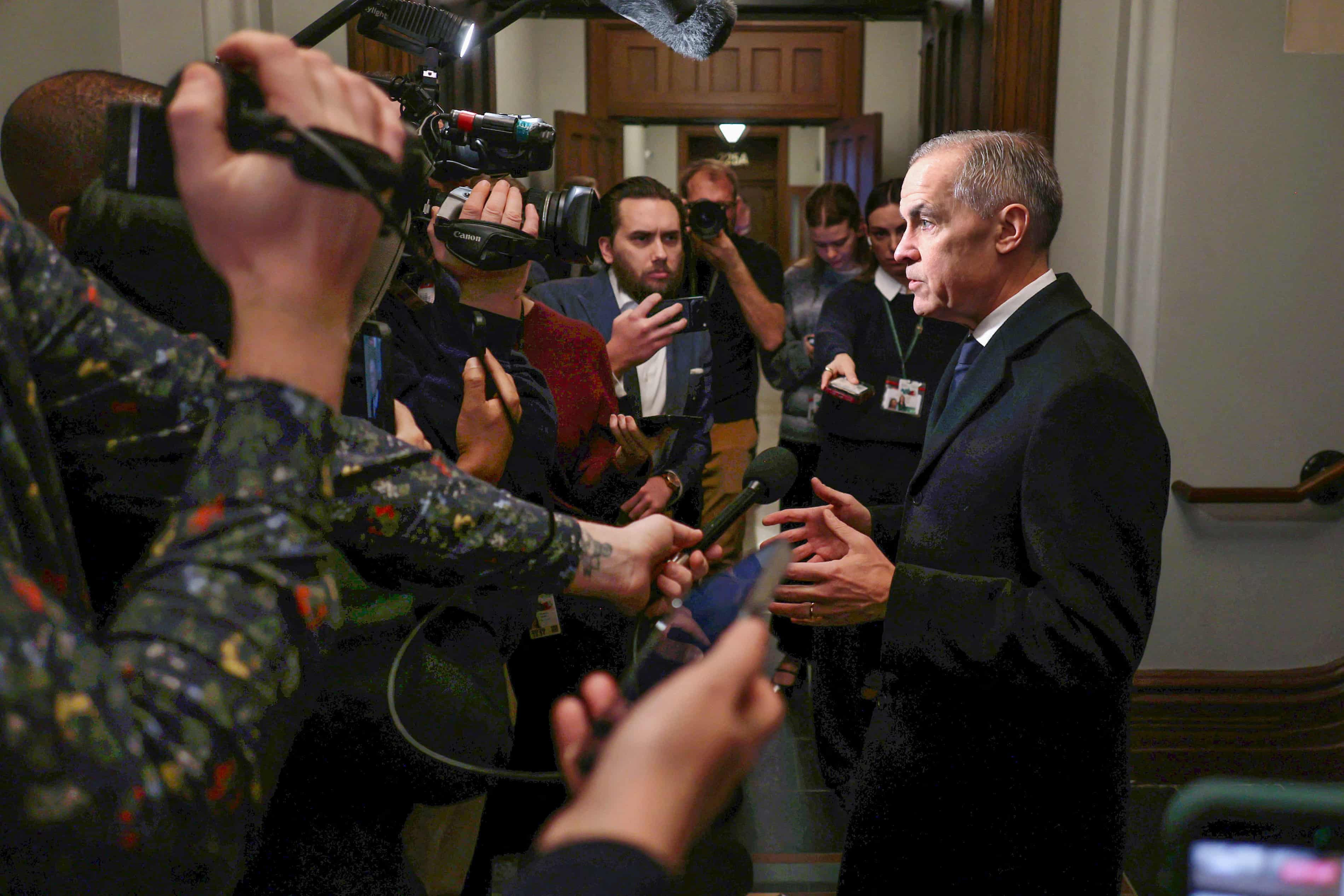 Canadian police identify suspect in school massacre that left nine dead