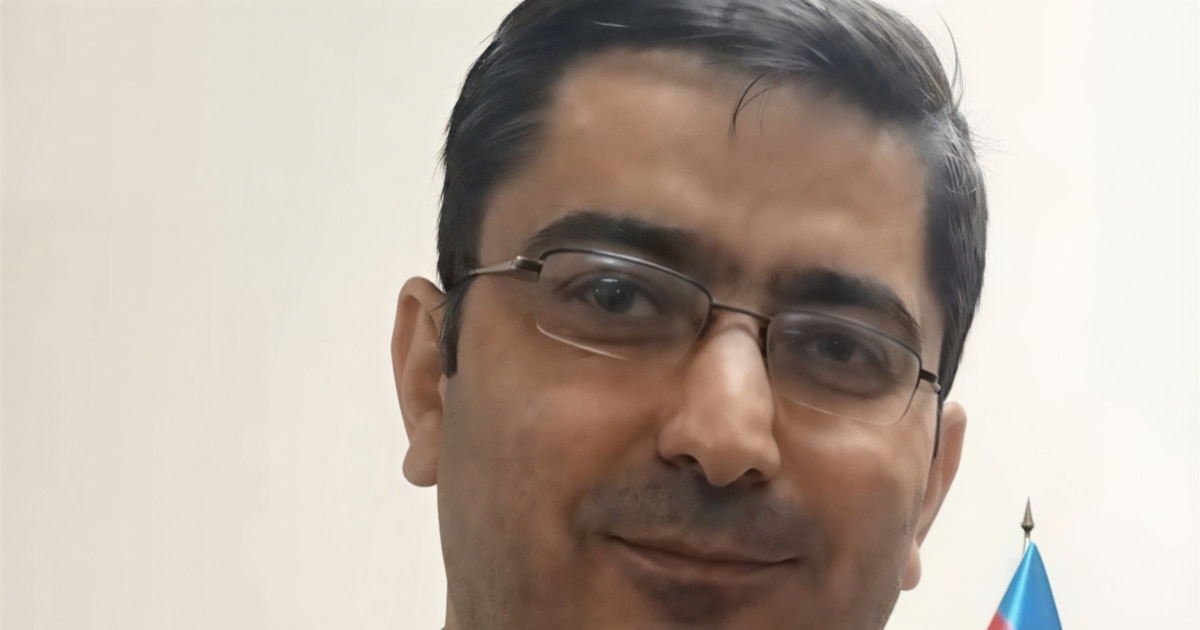 Azerbaijan teacher detained after criticizing government denies stabbing charge, says he and family are being mistreated